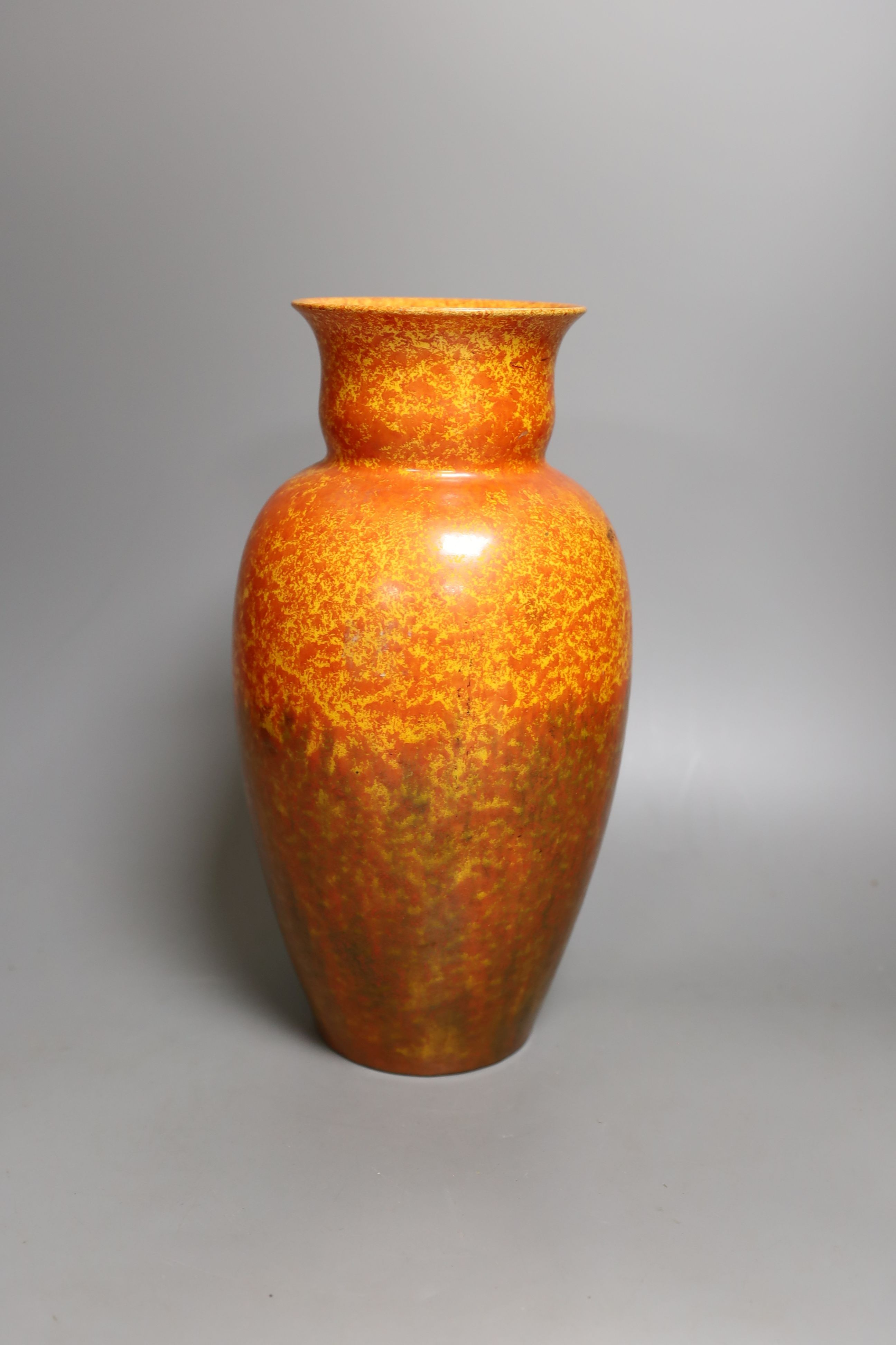 A Pilkington's Royal Lancastrian orange mottle glazed vase, 29 cms high.